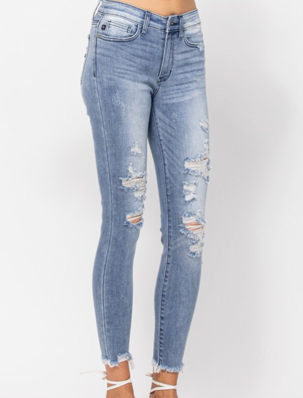 Mid-Rise Distressed Skinny Jeans